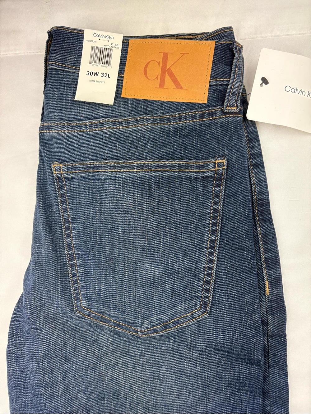 Calvin Klein Jeans Blue Denim with Tan Leather Patch